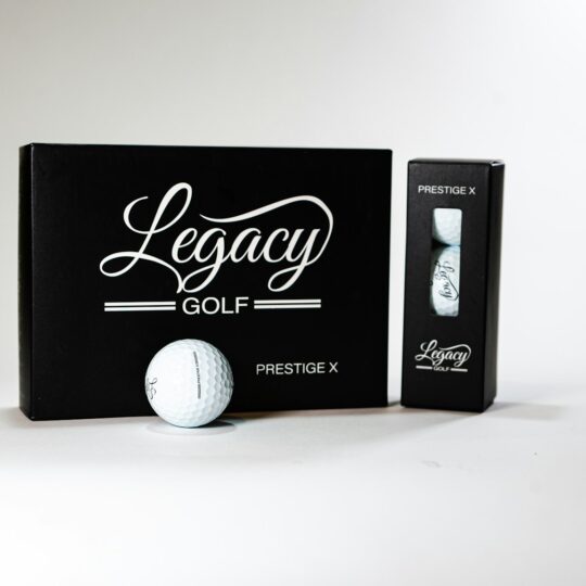 a black box with a white golf ball inside of it
