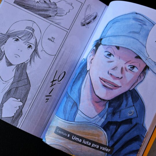 Open book displaying manga panels with character portraits
